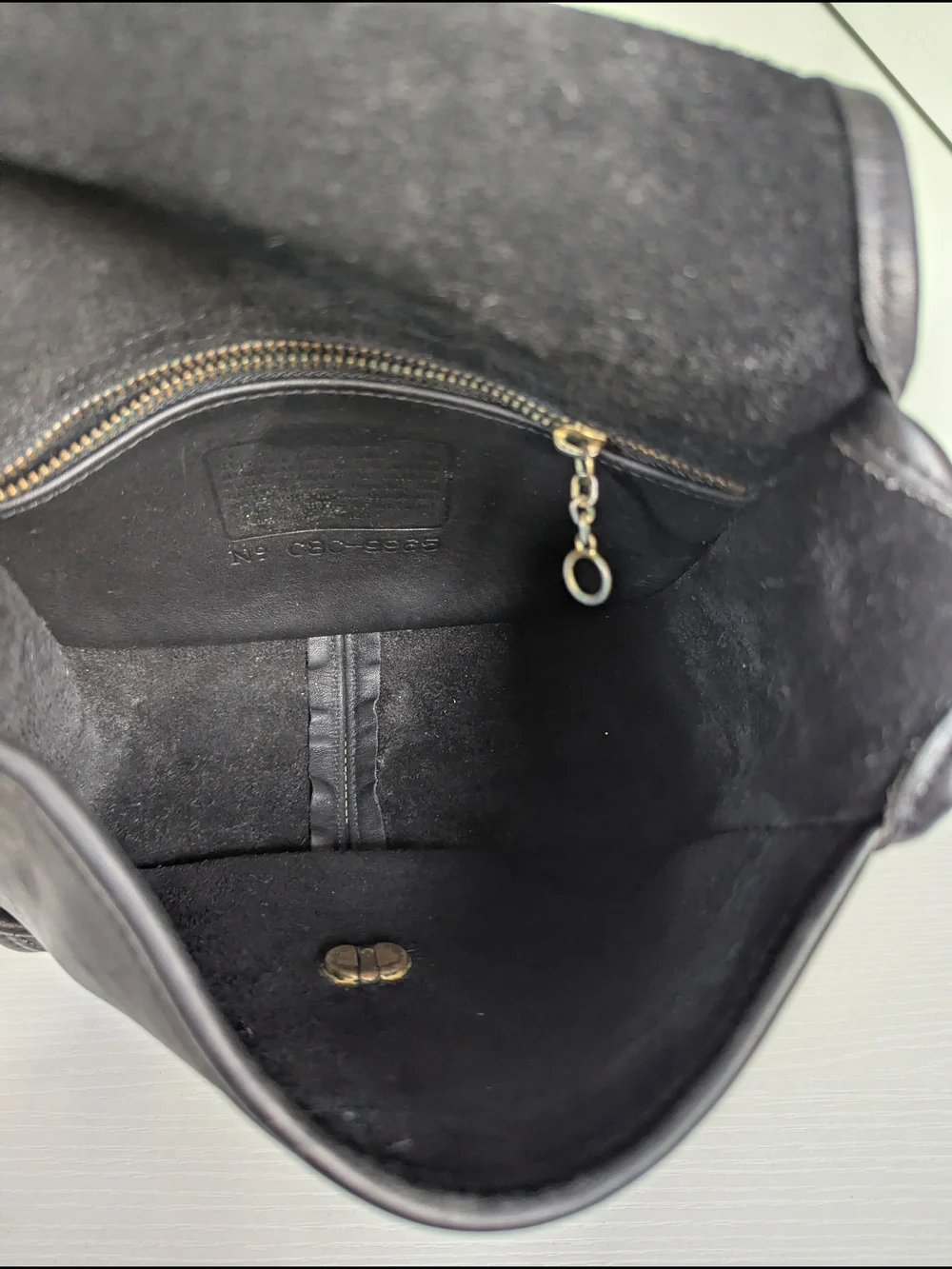 Coach Black Leather Crossbody with Gold Hardware and Cherry Charm